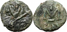 Tiberius III (698-705). AE Follis, Ravenna mint. D/ Crowned facing half-length bust, holding spear and shield. R/ Large M; cross above; in exergue, RA...