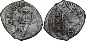 Theophilus (829-842). AE Follis, Constantinople mint. D/ Bust facing, crowned, holding globus cruciger. R/ Large M (mark of value) and rests of the de...