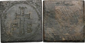 AE Square-shaped commercial weight for 2 ounce, 4-6 century AD. D/ Cross on base flanked by Greek letters, within wreath. Bendall, Weights, 71. AE. g....