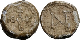 PB Seal, 8th-12th century. D/ Cruciform invocative monogram. R/ Monogram. Lead. g. 24.45 mm. 24.00 Good VF.