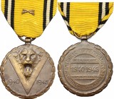 Belgium. AE Decoration 1945. D/ Head of roaring lion facing. R/ Inscription in both French and Dutch. AE. g. 27.67 mm. 36.00 With the original ribbon....