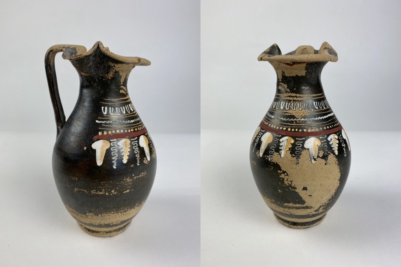 Greek Gnathia-Ware oinochoe. The body decorated with geometric band and vine and...