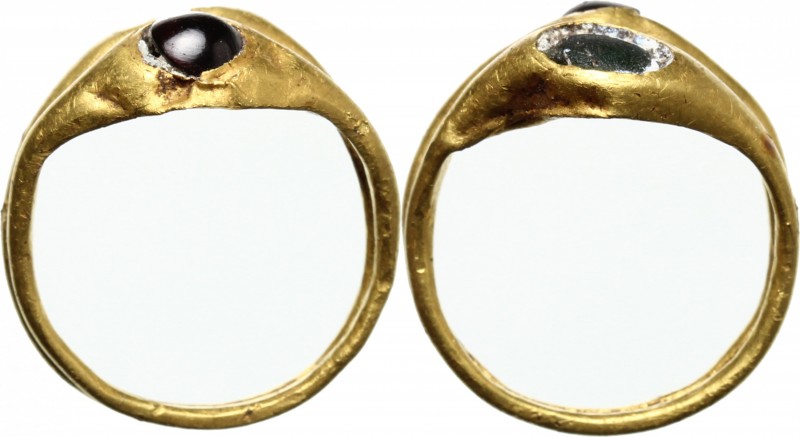 Gold double ring with glasspaste inlaids. Roman period, 1st-3rd century AD. Size...