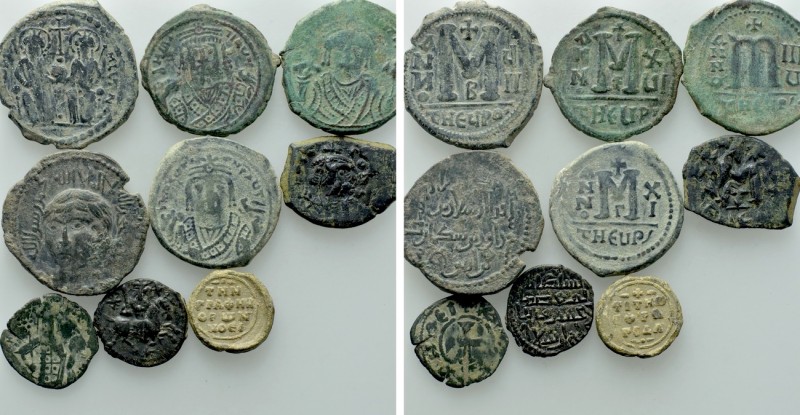 9 Byzantine and Islamic Coins. 

Obv: .
Rev: .

. 

Condition: See pictur...