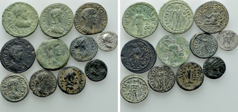 11 Roman Provincial Coins. 

Obv: .
Rev: .

. 

Condition: See picture.
...