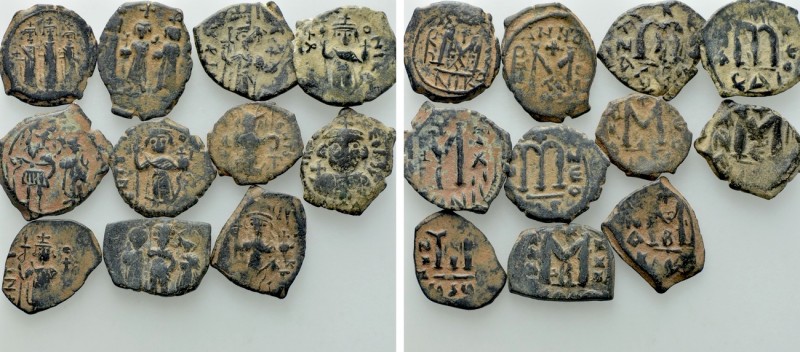 11 Byzantine Coins. 

Obv: .
Rev: .

. 

Condition: See picture.

Weigh...