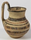 OBJEKTE AUS TON. 
GEFÄSSE. 
Daunische Keramik. Daunische Vase 7. - 6. Jh. v. Chr., hellbeiger Ton mit dunkelbrauner und roter Streifenbemalung, bauc...