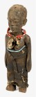 AFRIKANA. 
NIGERIA. 
EWE. Fetischpuppe. Weibliche Holzpuppe, Arme seitlich nach unten gestreckt, mit Perlenketten behängt, trägt um die Hüften gewic...
