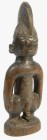 AFRIKANA. 
NIGERIA. 
YORUBA. Eere ibiji, stehend, Holz, Zwillingsfigur männlich, Kammfrisur, Körper mit Ritzdekor, auf rundem Sockel, H.24cm. . 

...