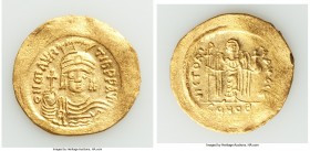 Maurice Tiberius (AD 582-602). AV solidus. VF, wavy flan. Constantinople, 3rd officina. o N mAVRC-TIb PP AVG, draped and cuirassed bust of Maurice Tib...