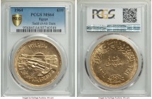 Arab Republic gold 10 Pounds AH 1384 (1964) MS64 PCGS, KM409, Fr-46. Commemorating the diversion of the Nile. AGW 1.4628 oz. 

HID09801242017

© 2...