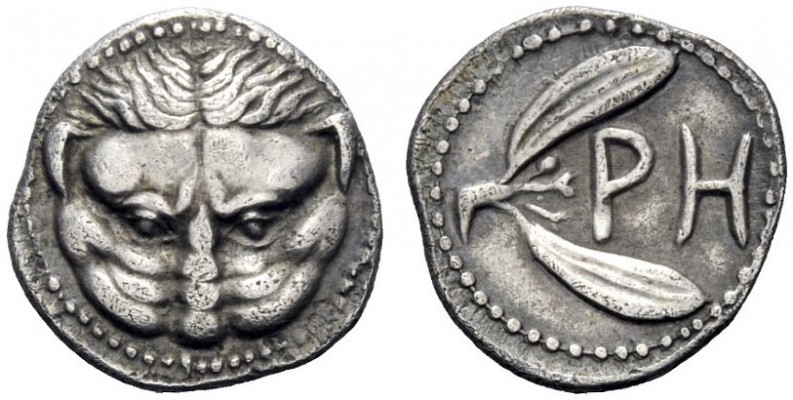  Greek Coins   Rhegium  Litra circa 425-420, AR 0.78 g. Lion mask facing. Rev. O...