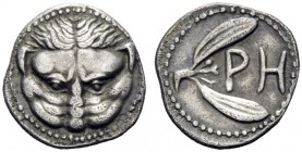  Greek Coins   Rhegium  Litra circa 425-420, AR 0.78 g. Lion mask facing. Rev. Olive sprig. Historia Numorum Italy 2492.  Light iridescent tone and go...