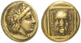  Greek Coins   Lesbos, Mytilene  Hecte circa 377-326, EL 2.53 g. Head of Dionysus r., wearing ivy wreath. Rev. Head of Silenus facing, within square f...