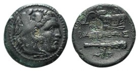 Kings of Macedon. Alexander III (336-323 BC). Æ (18mm, 5.10g, 3h). Uncertain mint in Western Asia Minor. Head of Herakles r., wearing lion skin.R/ Bow...