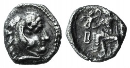 Kings of Macedon, Alexander III ‘the Great' (336-323 BC). AR Obol (7mm, 0.63g, 3h). Berytus, c. 323-320 BC. Head of Herakles r., wearing lion skin. R/...