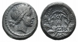 Mysia, Kyzikos, 2nd-1st century BC. Æ (16mm, 5.38g, 12h). Head of Kore Soteira r., wearing wreath of grain. R/ KY-ZI and monogram within an oak wreath...