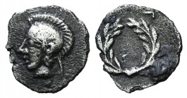Aeolis, Elaia, c. 450-400 BC. AR Hemiobol (7mm, 0.22g, 6h). Helmeted head of Athena l. R/ Wreath. SNG Copenhagen 164. Good VF