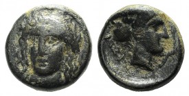 Caria, Iasos, c. 4th-3rd century BC. Æ (8mm, 1.13g, 12h). Laureate head of Apollo facing slightly l. R/ Head of nymph r., hair in sakkos; prawn to r. ...