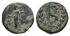 Phrygia, Laodicea, 1st century AD. Æ (14mm, 2.91g, 12h). Pythes Pythou magistrate. Wolf seated l. with double axe, all within wreath. R/ Aphrodite sta...