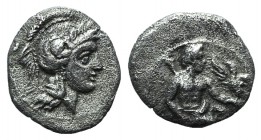 Cilicia, Uncertain, c. 4th century BC. AR Obol (9mm, 0.65g, 3h). Baaltars seated r., holding eagle and sceptre. R/ Helmeted head of Athena r. SNG BnF ...