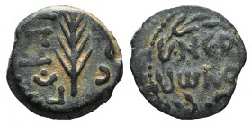 Judaea, Procurators. Porcius Festus (59-62 CE). Æ Prutah (14mm, 1.73g, 11h). Jerusalem, year 5 of Nero (58/9). Blundered legend within wreath. R/ Palm...