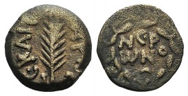 Judaea, Procurators. Porcius Festus (59-62 CE). Æ Prutah (15mm, 2.81g, 12h). Jerusalem, year 5 of Nero (58/9). Blundered legend within wreath. R/ Palm...