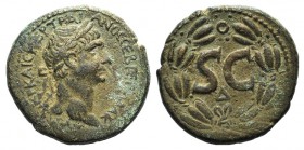 Trajan (98-117). Seleucis and Pieria, Antioch. Æ As (29mm, 17.27g, 12h). Laureate head r. R/ Large SC; Δ below; all within laurel wreath. McAlee 487d;...