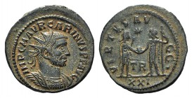 Carinus (283-285). Radiate (21mm, 3.45g, 10h). Tripolis, AD 284. Radiate and cuirassed bust r. R/ Carinus standing r., holding sceptre and receiving g...