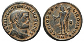 Constantius I (Caesar, 293-305). Æ Follis (25mm, 9.34g, 12h). Antioch, c. 302-3. Laureate head r. R/ Genius standing l., holding patera and cornucopia...