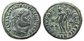 Constantius I (Caesar, 293-305). Æ Follis (25mm, 9.88g, 12h). Alexandria, AD 301. Laureate head r. R/ Genius standing l., holding patera and cornucopi...