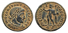 Constantine I (307/310-337). Æ Follis (19mm, 3.42g, 6h). Rome, AD 317. Laureate, draped and cuirassed bust r. R/ Sol standing l. holding globe and rai...