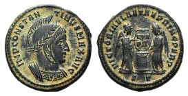 Constantine I (307/310-337). Æ Follis (17,4mm, 3,65g, 6h). Ticinum, 318-9. Laureate, helmeted and cuirassed bust r. R/ Two Victories standing vis à vi...