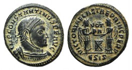 Constantine I (307/310-337). Æ Follis (16mm, 3.38g, 6h). Siscia, 318-9. Laureate, helmeted and cuirassed bust r. R/ Two Victories standing to either s...