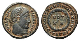 Constantine I (307/310-337). Æ Follis (18mm, 2.98g, 1h). Thessalonica, AD 320. Laureate head r. R/ Legend around VOT/XX in two lines; TSΓVI. RIC VII 8...