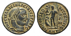 Licinius I (308-324). Æ Follis (20mm, 3.10g, 6h). Antioch, 313-4. Laureate head r. R/ Jupiter standing l. holding Victory on a globe and sceptre; at f...