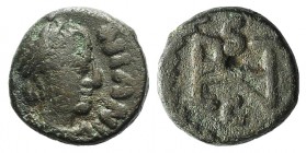 Ostrogoths, Athalaric (526-534). Æ (8mm, 1.37g, 12h). Ravenna, in the name of Justinian. Diademed, draped and cuirassed bust r. R/ Monogram within wre...