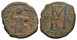 Justinian I (527-565). Æ 40 Nummi (34mm, 15.96g, 6h). Theoupolis (Antioch), c. 529-533. Justinian seated facing on throne, holding sceptre and globus ...