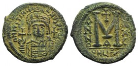 Justinian I (527-565). Æ 40 Nummi (36mm, 18.29g, 5h). Theoupolis (Antioch), year 20 (546/7). Helmeted and cuirassed facing bust, holding globus crucig...