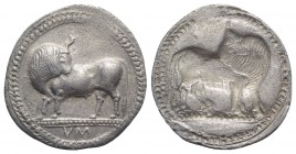 Southern Lucania, Sybaris, c. 550-510 BC. AR Stater (29mm, 7.75g, 12h). Bull standing l. on dotted exergual line, looking back. R/ Incuse bull standin...