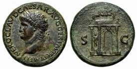 Nero (54-68). Æ Sestertius (34mm, 27.92g, 7h). Lugdunum, c. AD 65. Laureate head l., globe at point of neck. R/ Triumphal arch surmounted by emperor i...