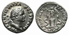 Vespasian (69-79). AR Denarius (18mm, 2.55g, 7h). Rome, AD 75. Laureate head r. R/ Victory standing l. on cista mistica, holding wreath and palm frond...