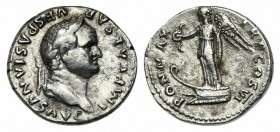 Vespasian (69-79). AR Denarius (19mm, 2.98g, 6h). “Judaea Capta” series. Rome, AD 75. Laureate head r. R/ Victory standing l. on prow, holding wreath ...