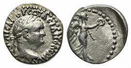 Vespasian (69-79). Cappadocia, Caesarea-Eusebia. AR Hemidrachm (14mm, 1.65g, 12h). Laureate head r. R/ Nike advancing r., holding wreath and palm fron...