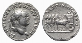 Titus (Caesar, 69-79). AR Denarius (18mm, 3.20g, 6h). Rome, AD 79. Laureate head r. R/ Slow quadriga l., drawing garlanded cart containing flower. RIC...