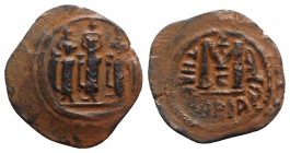Islamic, Umayyad Caliphate. Uncertain period (pre-reform). AH 41-77 / AD 661-697. Æ Fals (27mm, 4.26g, 9h). Arab-Byzantine type. Tabariyya (Tiberias) ...