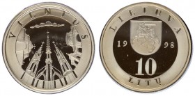 Lithuania 10 Litų 1998 Averse: Shielded arms divide date value below. Reverse: Vilnus building tops as seen from ground level. Edge Lettering: VILNIUS...