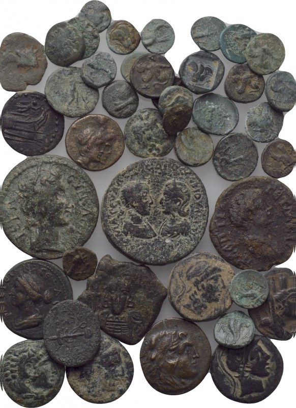 33 Ancient Coins. 

Obv: .
Rev: .

. 

Condition: See picture.

Weight:...