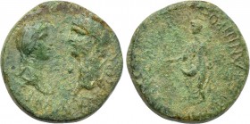 LYDIA. Tralles (as Caesarea). Claudius with Messalina and Britannicus (41-54). Ae.