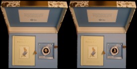 Fifty Pence 2018 Peter Rabbit Gold Proof S.H44 in the Limited Edition coin and book gift box, the coin FDC in the paperweight-style holder in the larg...